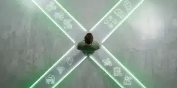 An overhead view of a person standing on glowing digital pathways, symbolizing the convergence of automation, remote work, and the gig economy in the evolving workforce.